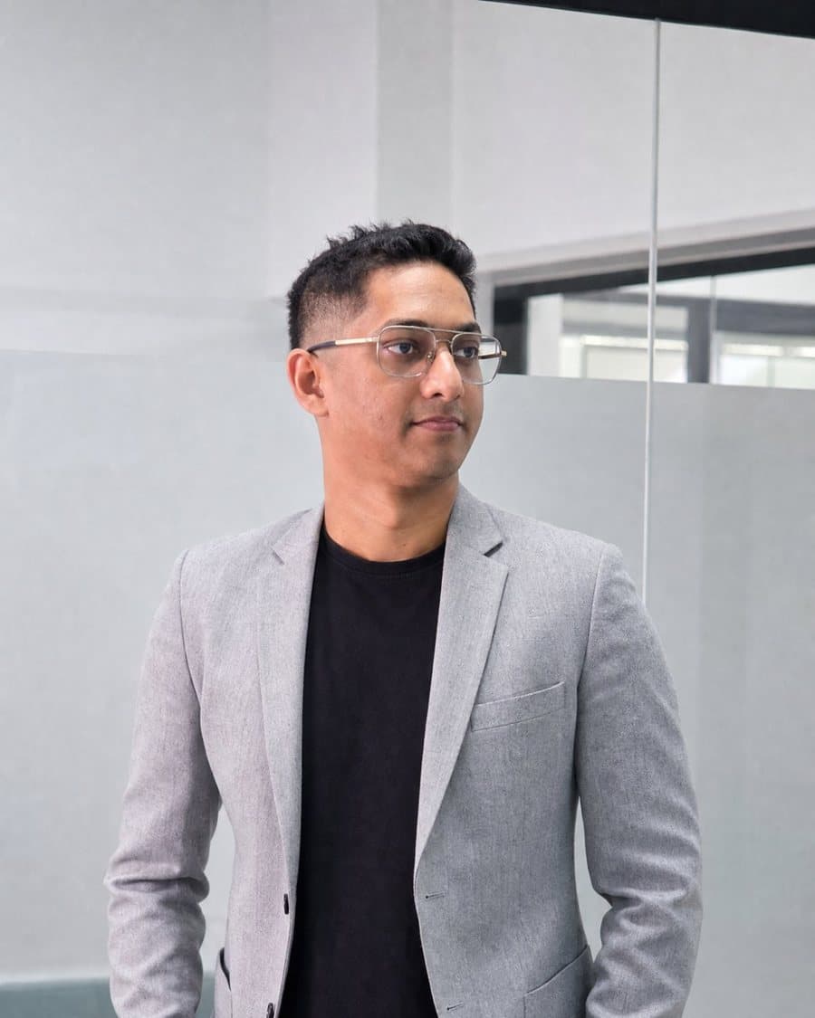 Ravi Kowlessur in a grey blazer